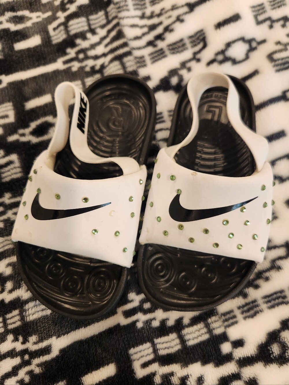 Nike White and Black Kids' Slide Sandals with Green Gem Accents, Size 9T